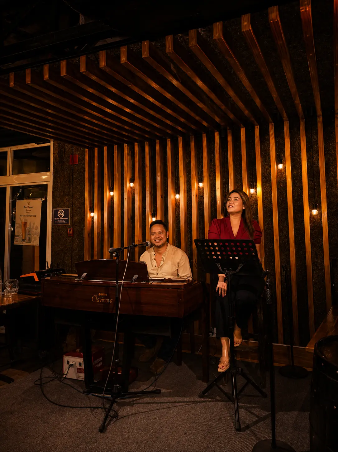An acoustic musician performing at Cork Room